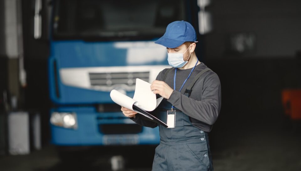 Man in a mask. Receipt of goods for coronavirus. Stop coronavirus